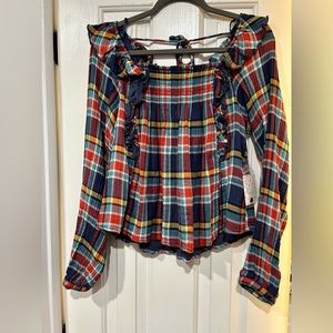 Free People. Size small. Plaid top